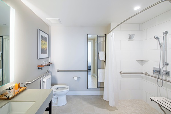 Shower, designer toiletries, towels