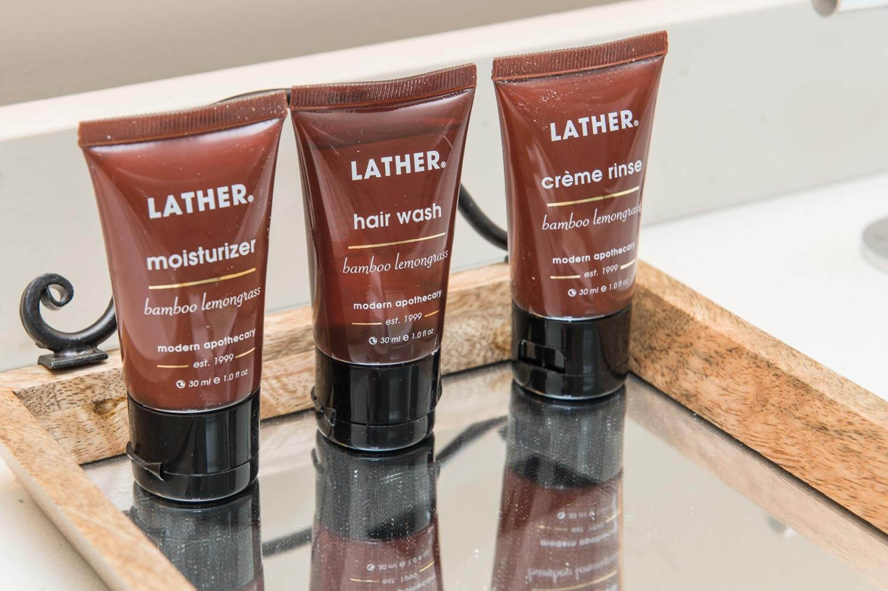 shower, designer toiletries, towels