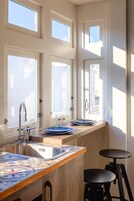 Fridge, coffee/tea maker, electric kettle, cookware/dishes/utensils