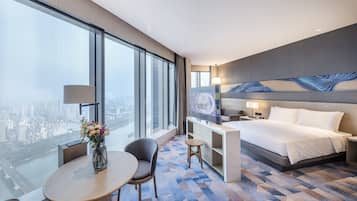 Premium bedding, down duvets, Select Comfort beds, minibar