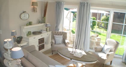 Exclusive apartment with garden and fireplace near the beach