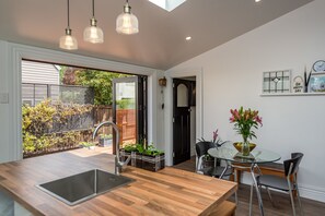 House, 3 Bedrooms | Living area | Flat-screen TV, fireplace - Sweet Lemon Cottage (Christchurch)