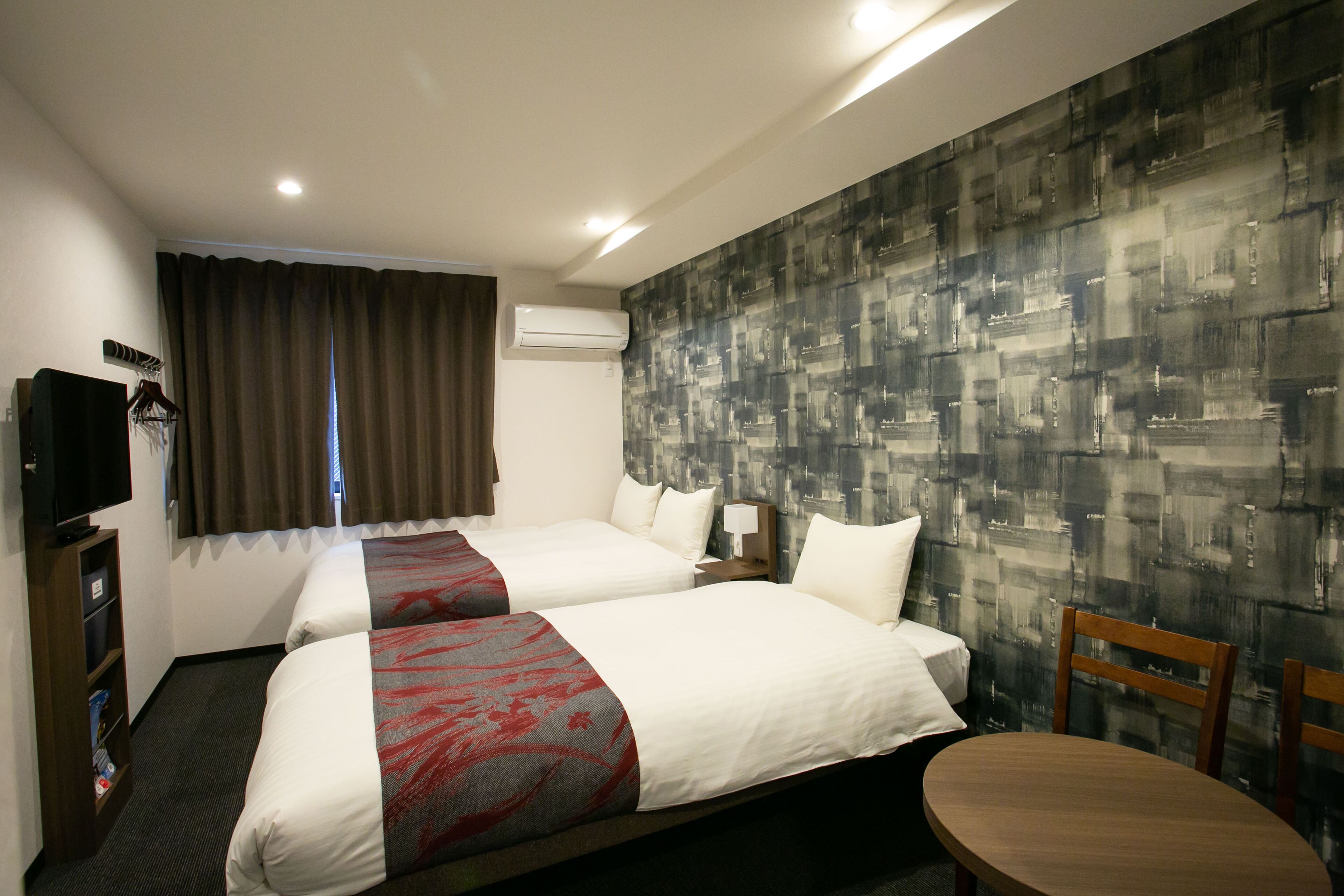 twin room | premium bedding, down duvets, pillow-top beds, desk