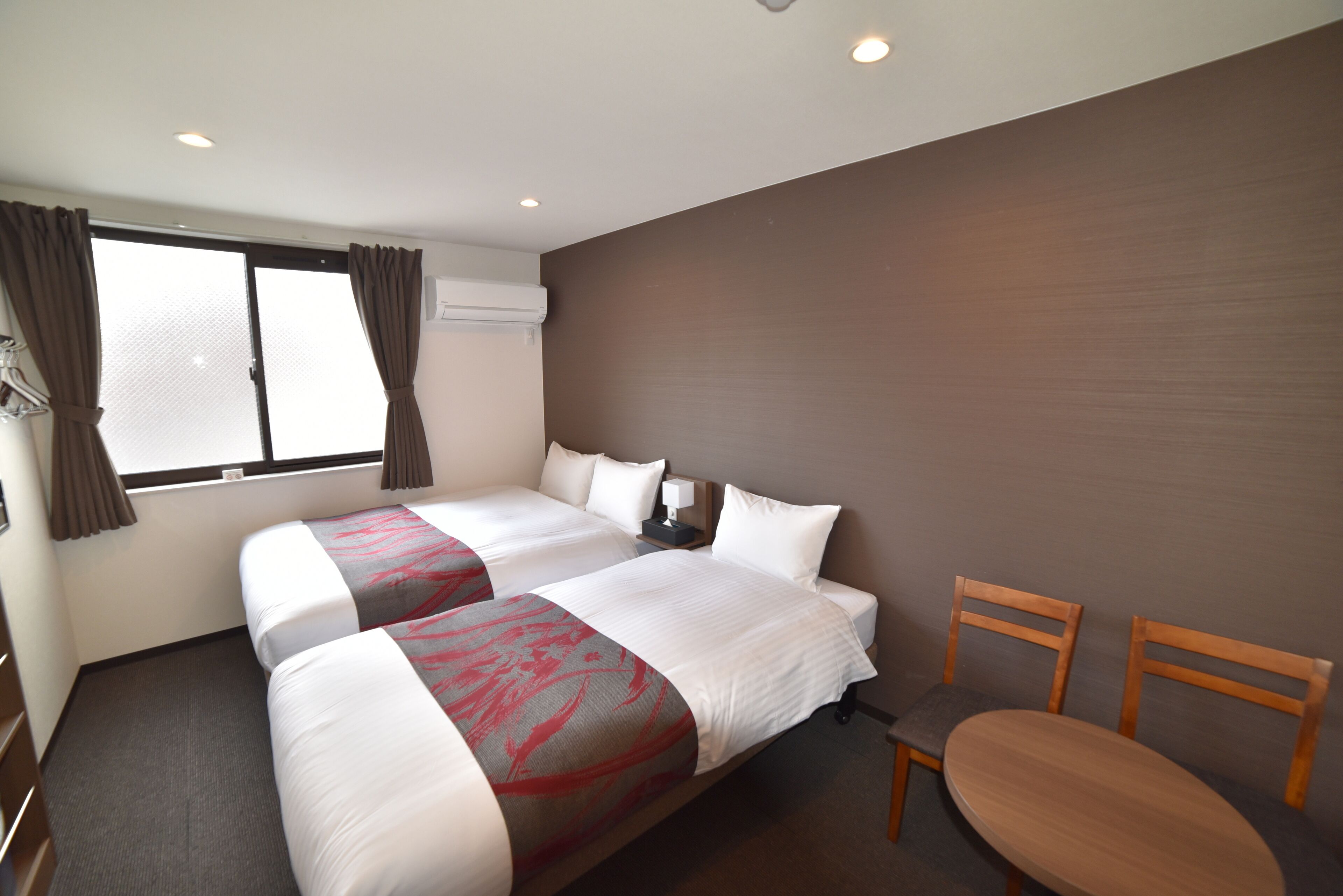 twin room | premium bedding, down duvets, pillow-top beds, desk