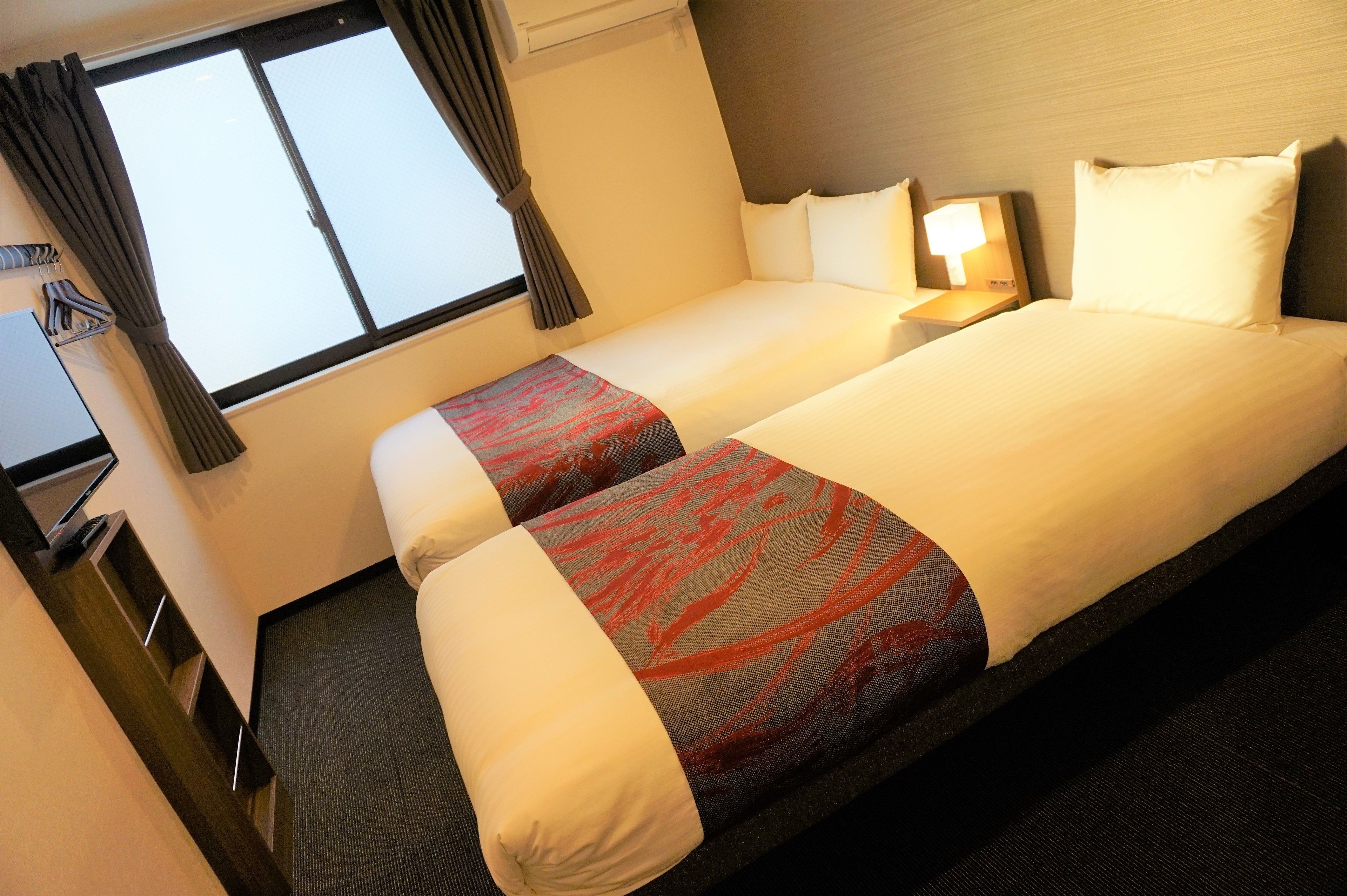 twin room | premium bedding, down duvets, pillow-top beds, desk