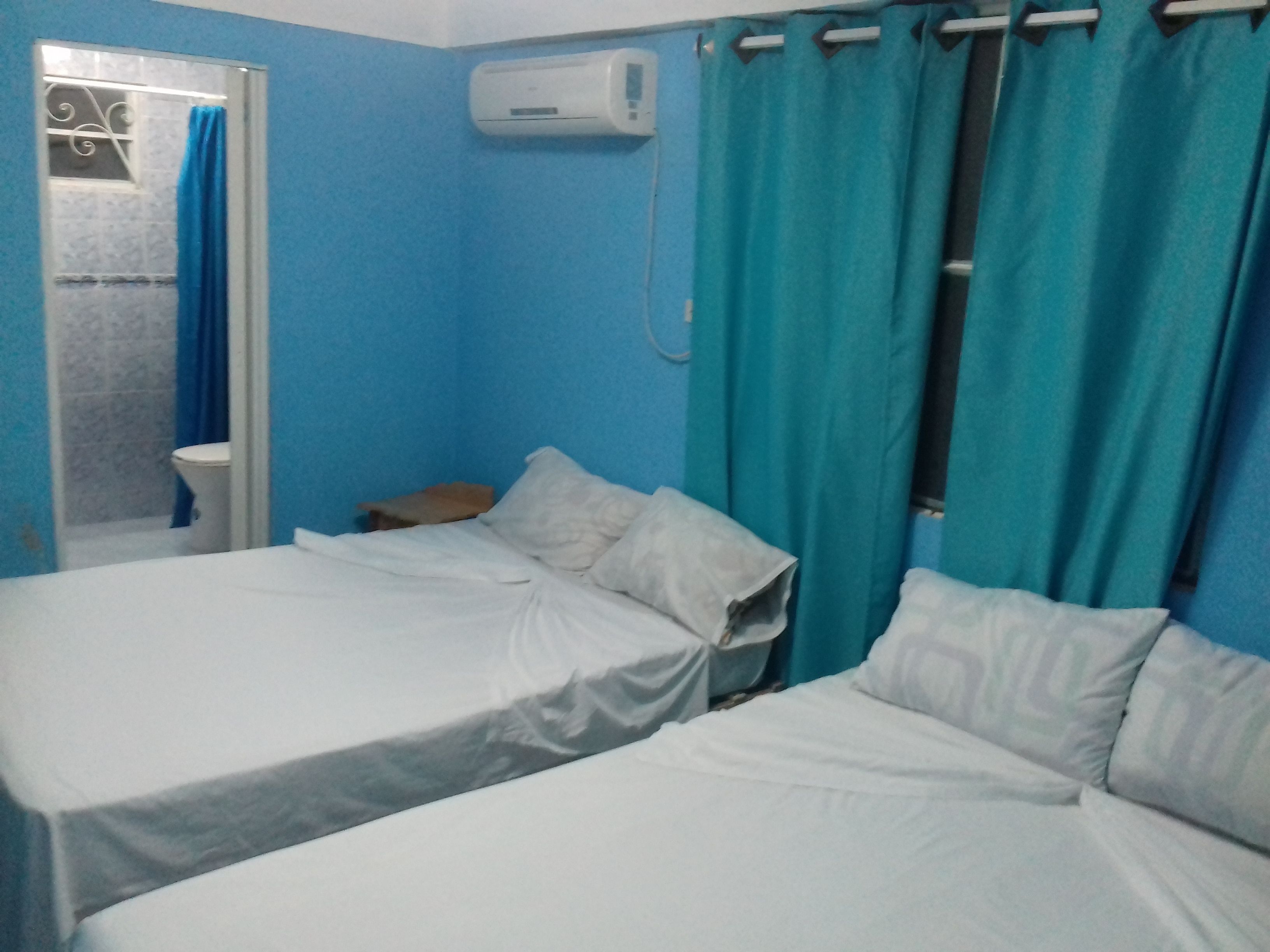 Standard Quadruple Room, 2 Double Beds, Smoking | Minibar, free WiFi, bed sheets