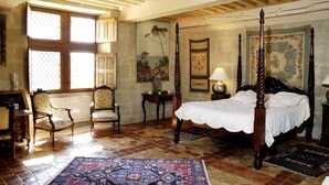 A bedroom with a four-poster bed, wooden furniture, and a large window. -  A privileged vacation out of time, Be the Châtelains of the Manor.     (Birac-sur-Trec)