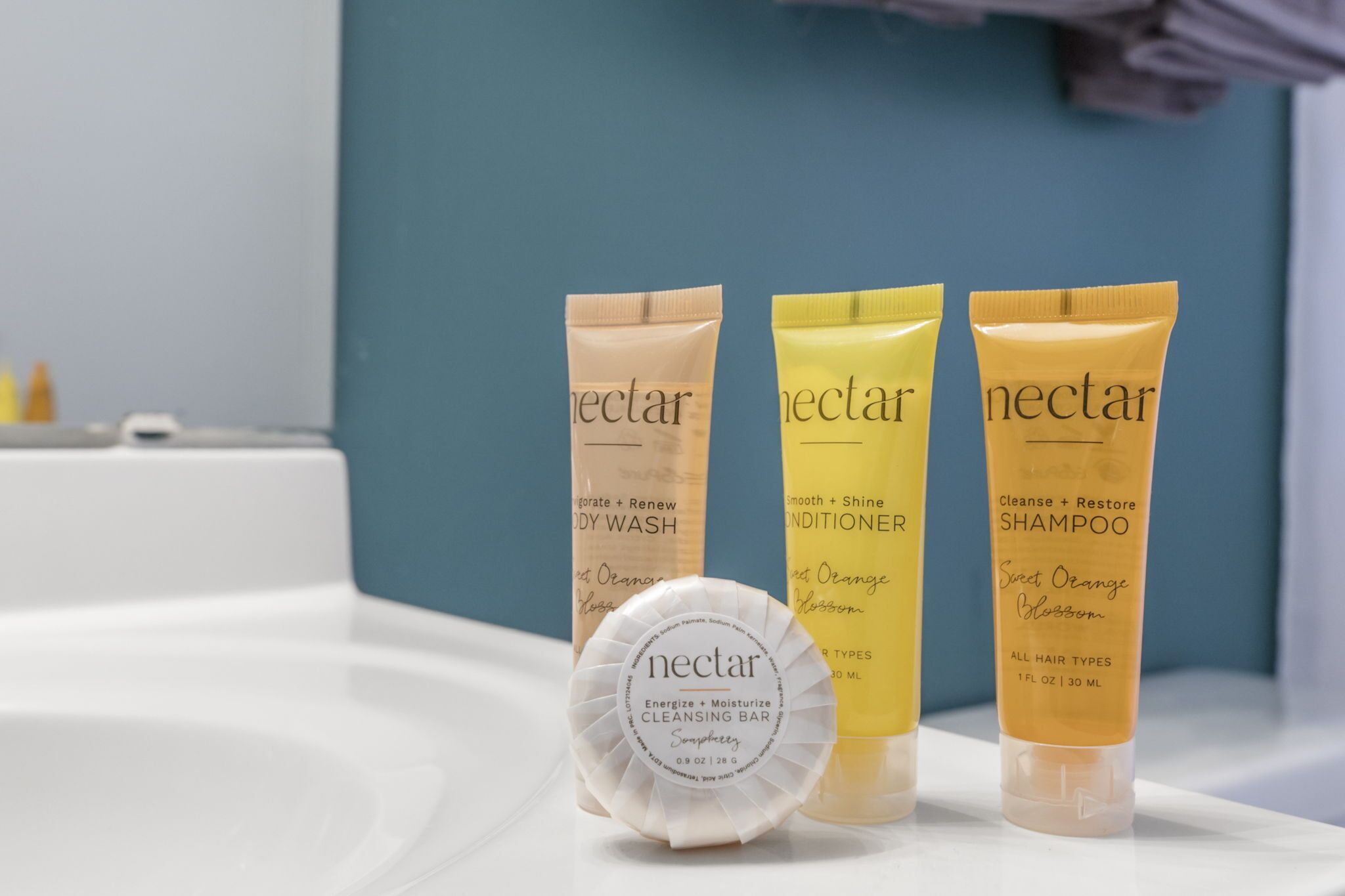 Three nectar products on a white surface.