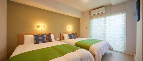 Suite Twin Room | Iron/ironing board, free WiFi, bed sheets