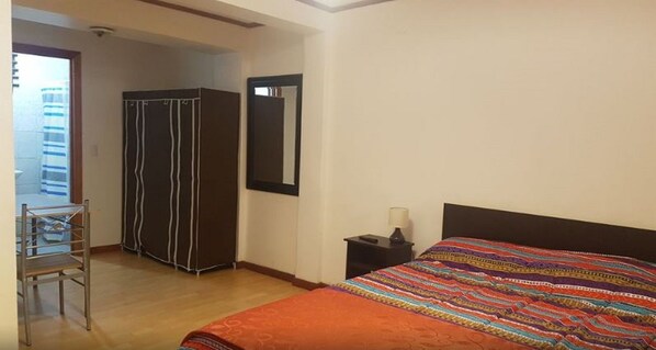 Desk, blackout curtains, soundproofing, iron/ironing board