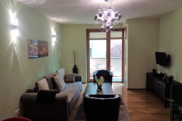 Open Plan Living Room with Balcony Access