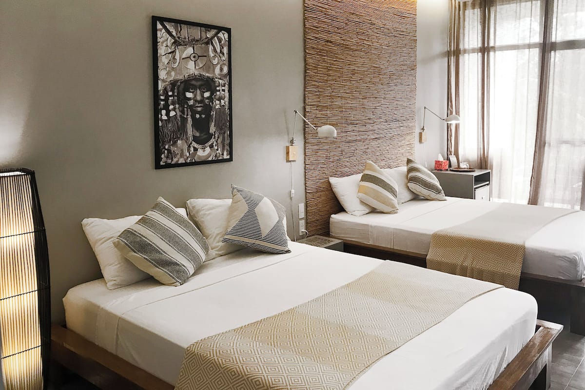 Family Room | 1 bedroom, premium bedding, minibar, in-room safe