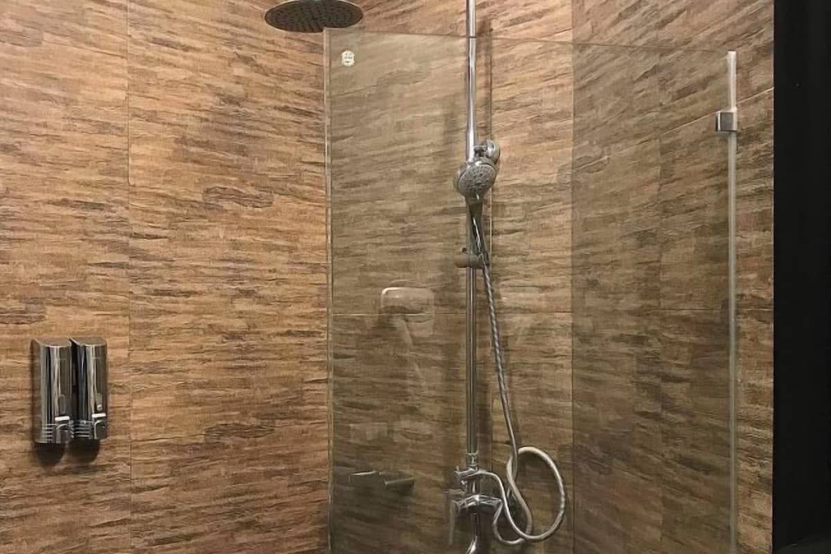 Shower, rainfall showerhead, eco-friendly toiletries, hair dryer