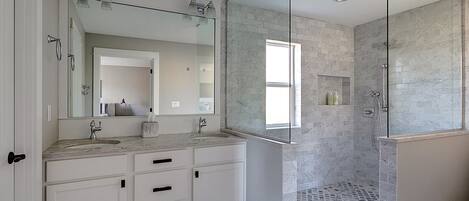 Combined shower/tub, hair dryer, towels, soap