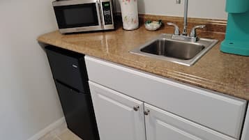 Fridge, microwave, coffee/tea maker, toaster