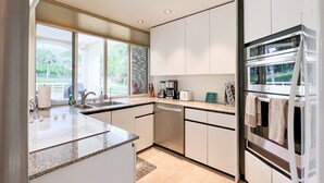 A modern kitchen with a dishwasher, a coffee maker, and a toaster. -  Beautiful, Palms At Wailea Condo #608- 2BR/2BA,GREAT LOCATION! SPECIAL Rates (Wailea)