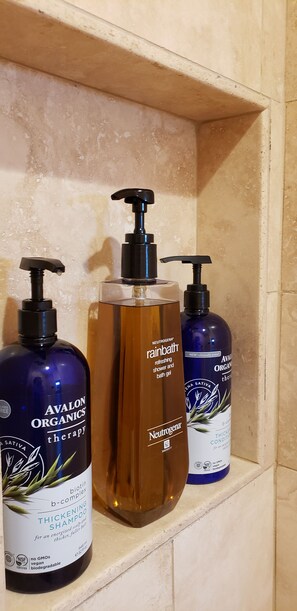 Shower, hair dryer, towels, soap