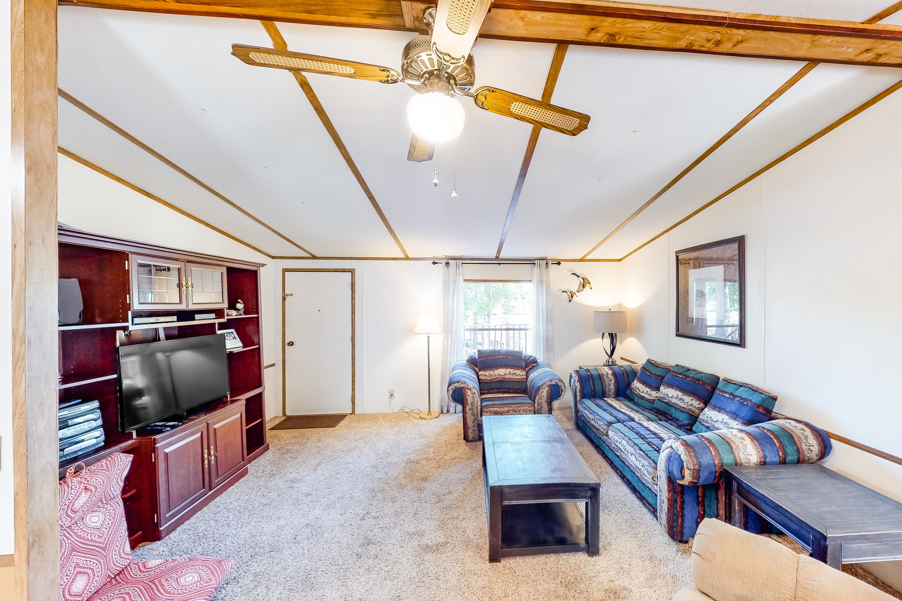 Lakefront home with deck, grill, boat ramp & dock - snowbird-friendly