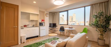 Apartment Quadruple Room, City View | Blackout curtains, iron/ironing board, free WiFi, bed sheets