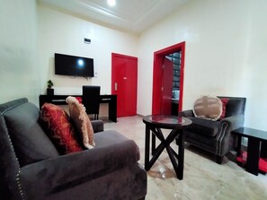 Executive Suite, 1 King Bed, Non Smoking | Living room | Flat-screen TV - BoardWalk Hotel Wuse 2 (Abuja)