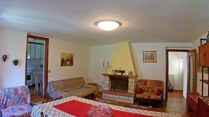 Apartment, 2 Bedrooms | Living area | TV, fireplace - Holideal Casa Luisa (Tremosine)