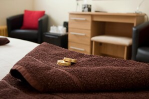 Ropa de cama de alta calidad, minibar, cortinas opacas