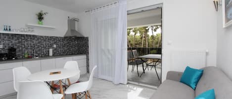 Apartment, 2 Bedrooms | Living area | TV