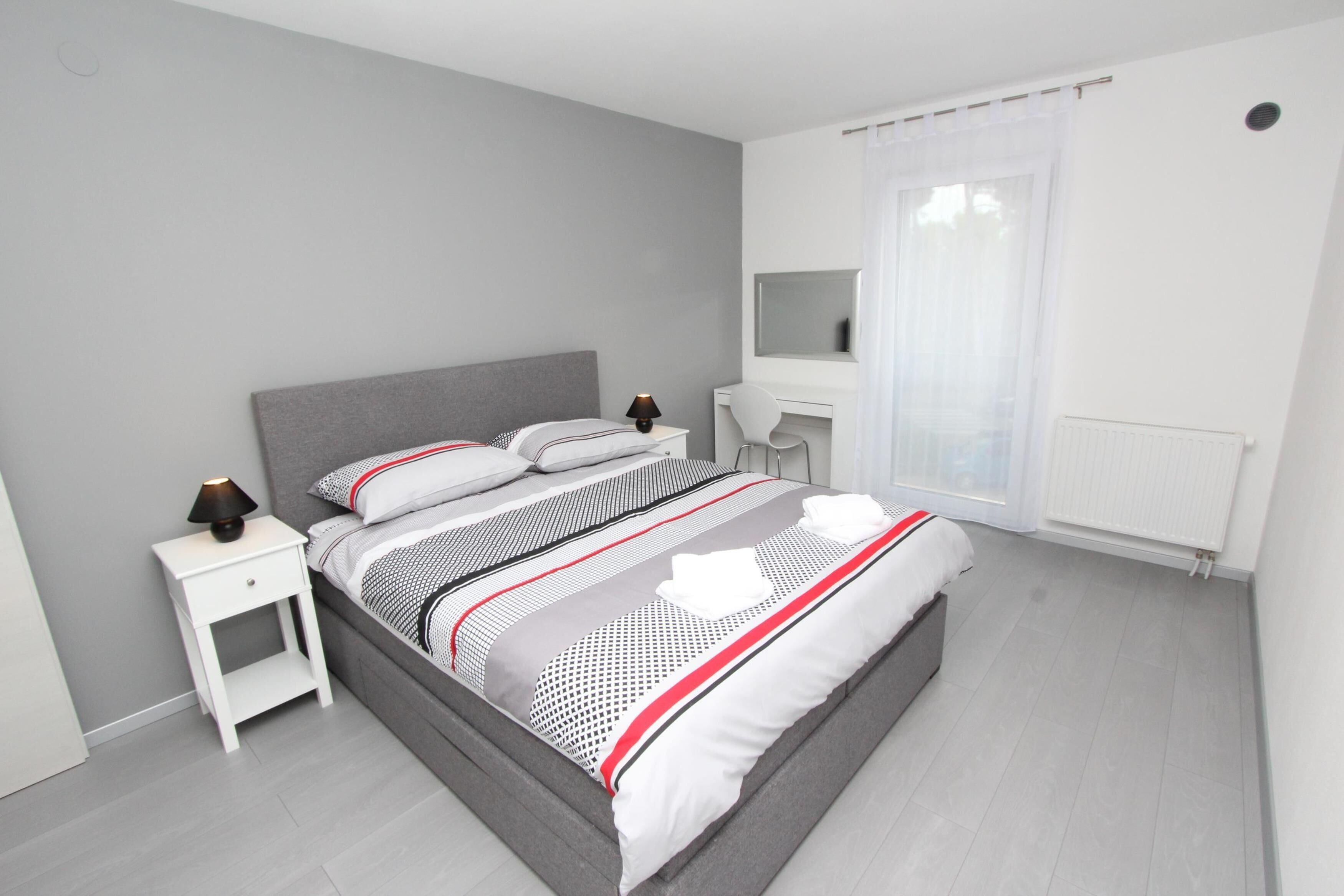 Apartemen, 2 kamar tidur | 2 kamar tidur, setrika/meja setrika, Wi-Fi gratis, dan seprai linen