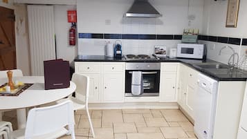 Family Apartment, 3 Bedrooms, Kitchen, Garden Area | Private kitchen | Full-size fridge, microwave, oven, stovetop