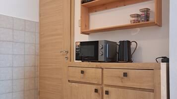 Apartment, 2 Bedrooms | Private kitchen | Fridge, stovetop, coffee/tea maker, electric kettle