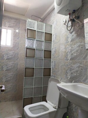 Shower, rainfall showerhead, free toiletries, bathrobes - BoardWalk Hotels Zone 5 (Abuja)
