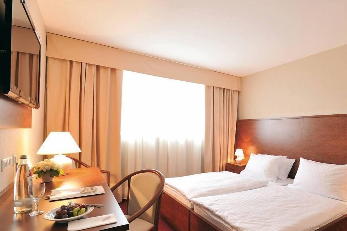 Desk, blackout drapes, cribs (free), WiFi (free)
