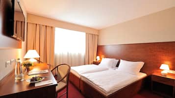 Desk, blackout curtains, free cots/infant beds, free WiFi