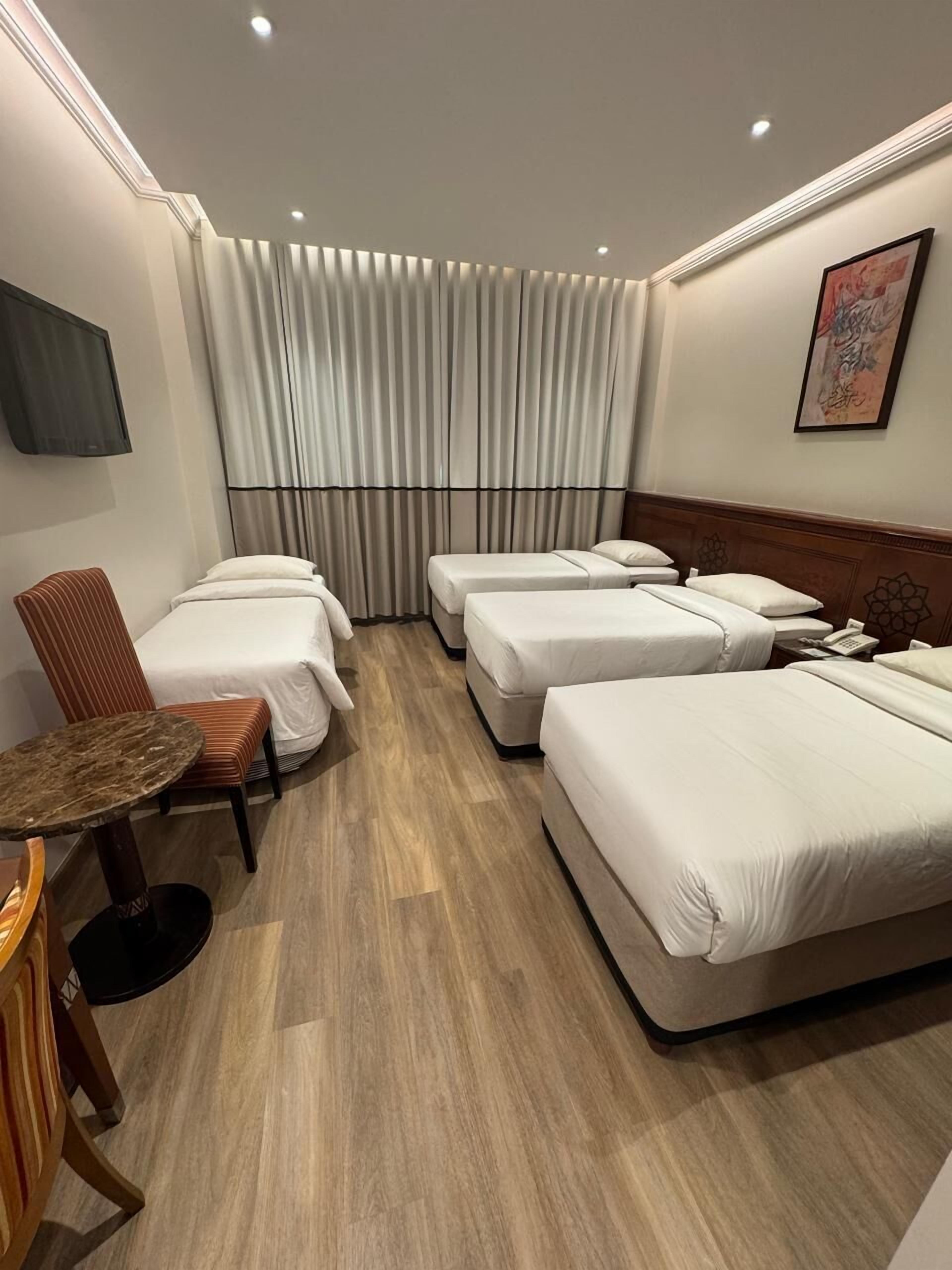 Standard Quadruple Room | Egyptian cotton sheets, premium bedding, pillow-top beds