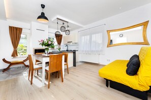 Appartement, 1 chambre | Coin séjour