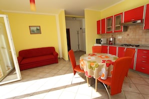 Apartment, 1 Schlafzimmer (2) | Wohnbereich | Flachbildfernseher