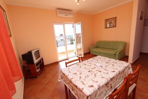 Departamento, 1 habitación (3) | Área de sala de estar | Televisión de pantalla plana 
