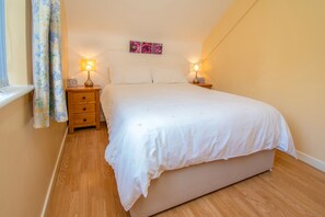 Rideaux occultants, chambres insonorisées, fer et planche à repasser