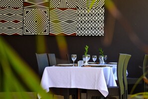 Breakfast, lunch, dinner served; local and international cuisine 