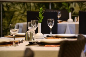 Breakfast, lunch, dinner served; local and international cuisine 