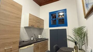 Exclusive Apartment, Sea View | 1 bedroom, in-room safe, iron/ironing board, free WiFi
