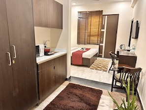 Deluxe Room, Multiple Beds, Smoking - Hollyhocks Residency (Gurugram)