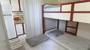 Family Room | Premium bedding, Select Comfort beds, individually furnished, desk