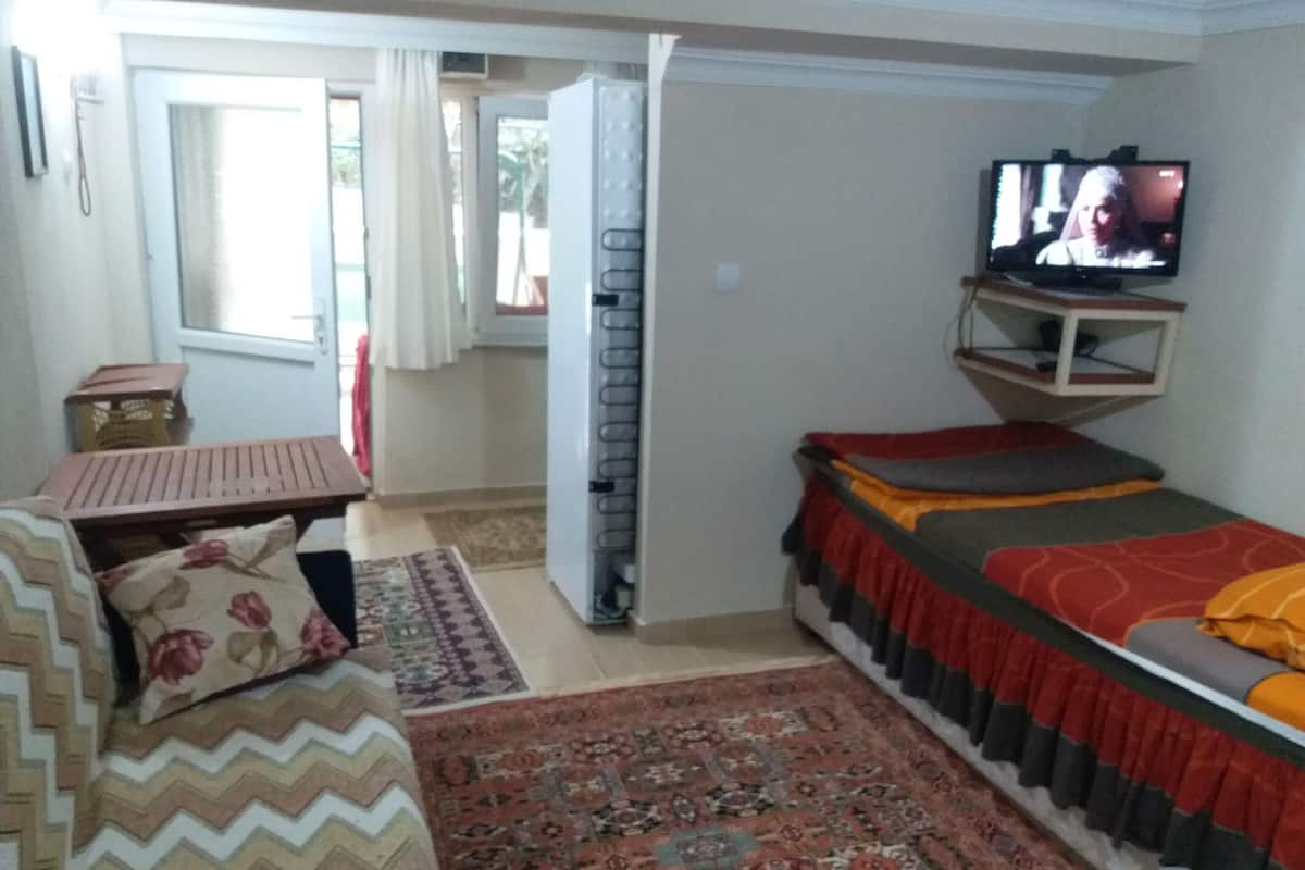 Standard Quadruple Room, Garden View | Premium bedding, Select Comfort beds, individually furnished, desk