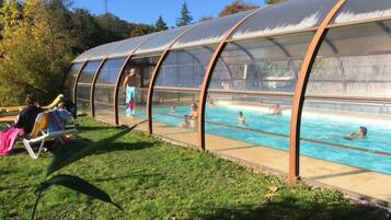Seasonal outdoor pool, pool umbrellas, pool loungers