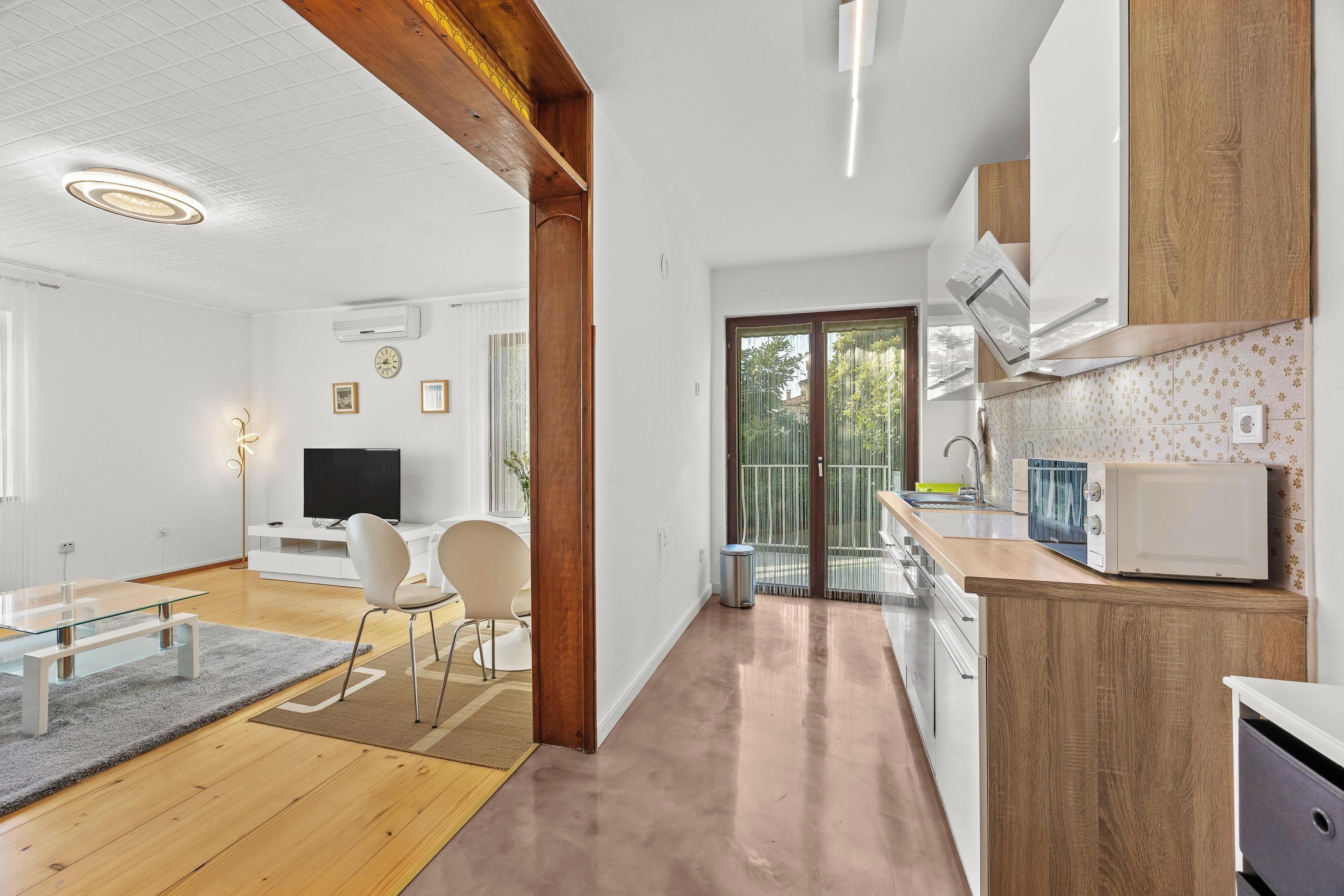 Apartment, 2 Bedrooms, Balcony | Living area | Flat-screen TV