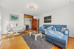 Apartment, 2 Bedrooms, Balcony | Living area | Flat-screen TV