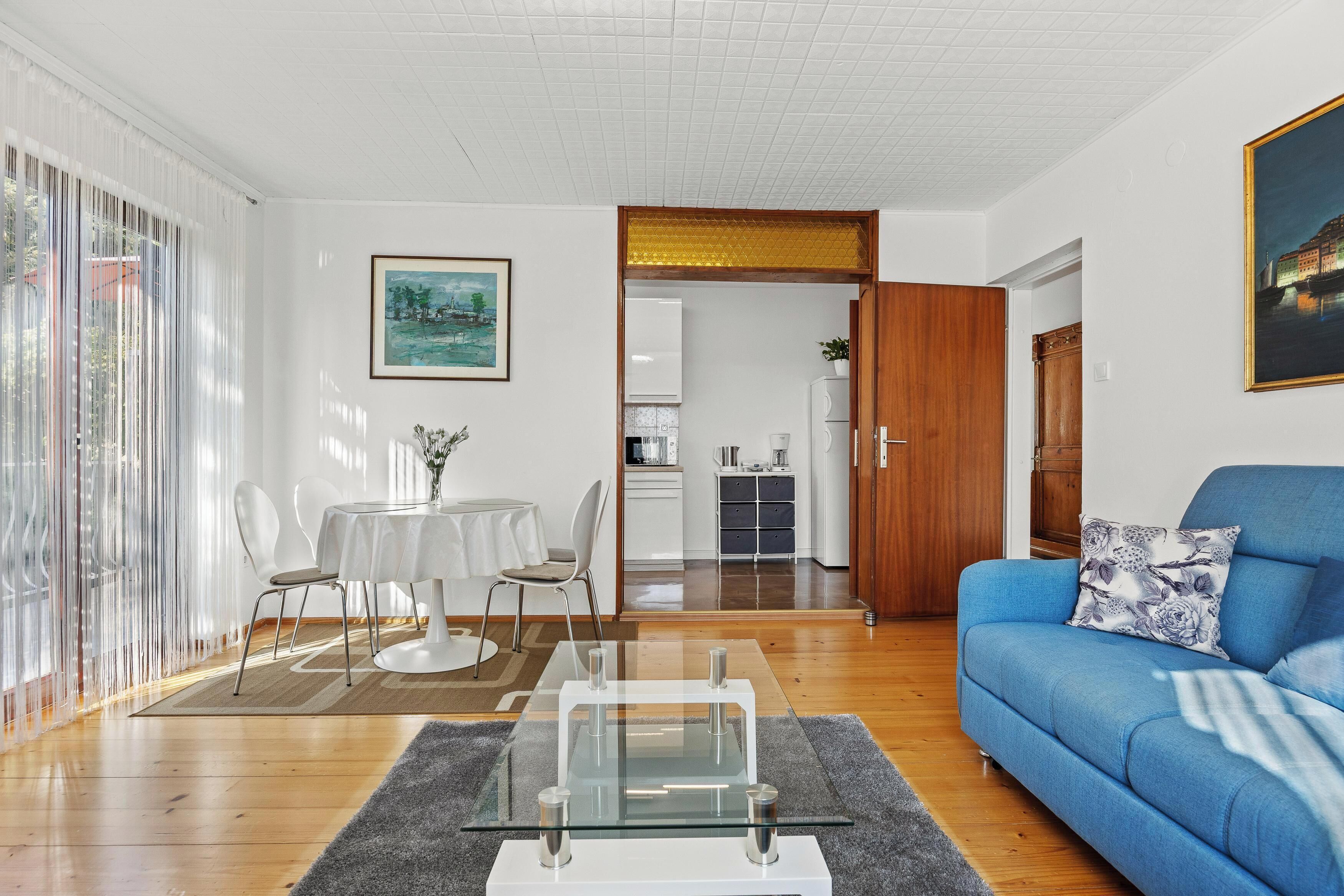 Apartment, 2 Bedrooms, Balcony | Living area | Flat-screen TV