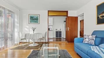 Apartment, 2 Bedrooms, Balcony | Living area | Flat-screen TV