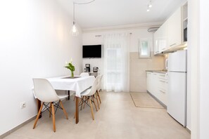 Appartamento, 2 camere da letto | Cucina privata | Frigorifero, piano cottura, macchina per tè/caffè, bollitore elettrico